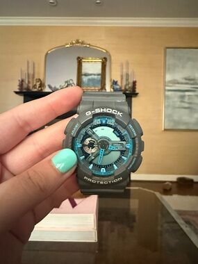 G-SHOCK Gray Watch with Teal Accents